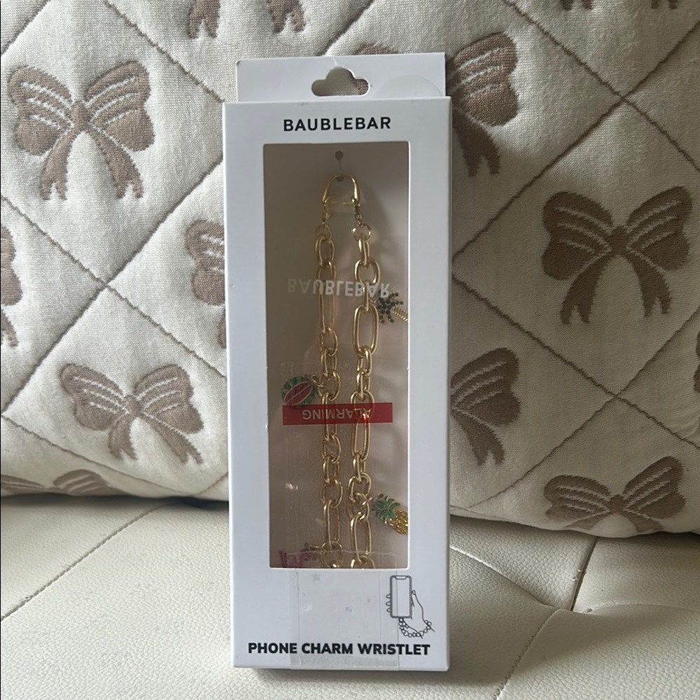 BaubleBar Gold Tropical Themed Charm Wristlet